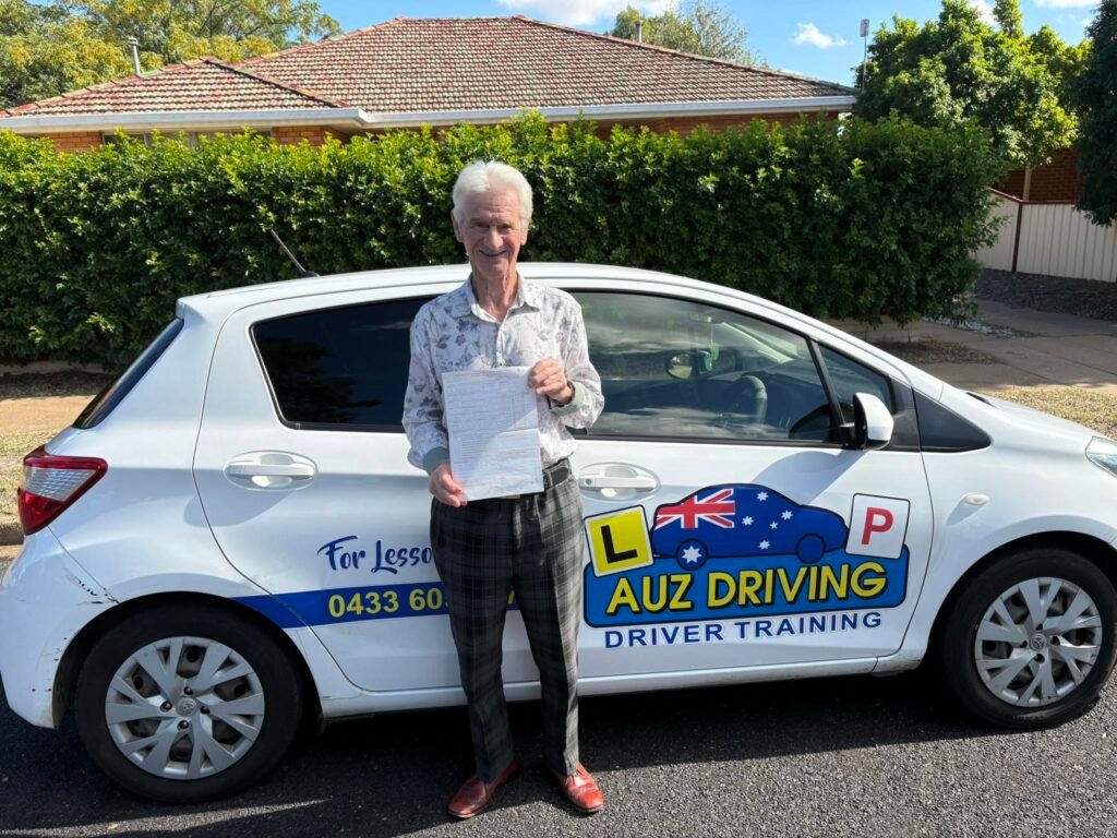 John Passed driving test by AUZ Driving School